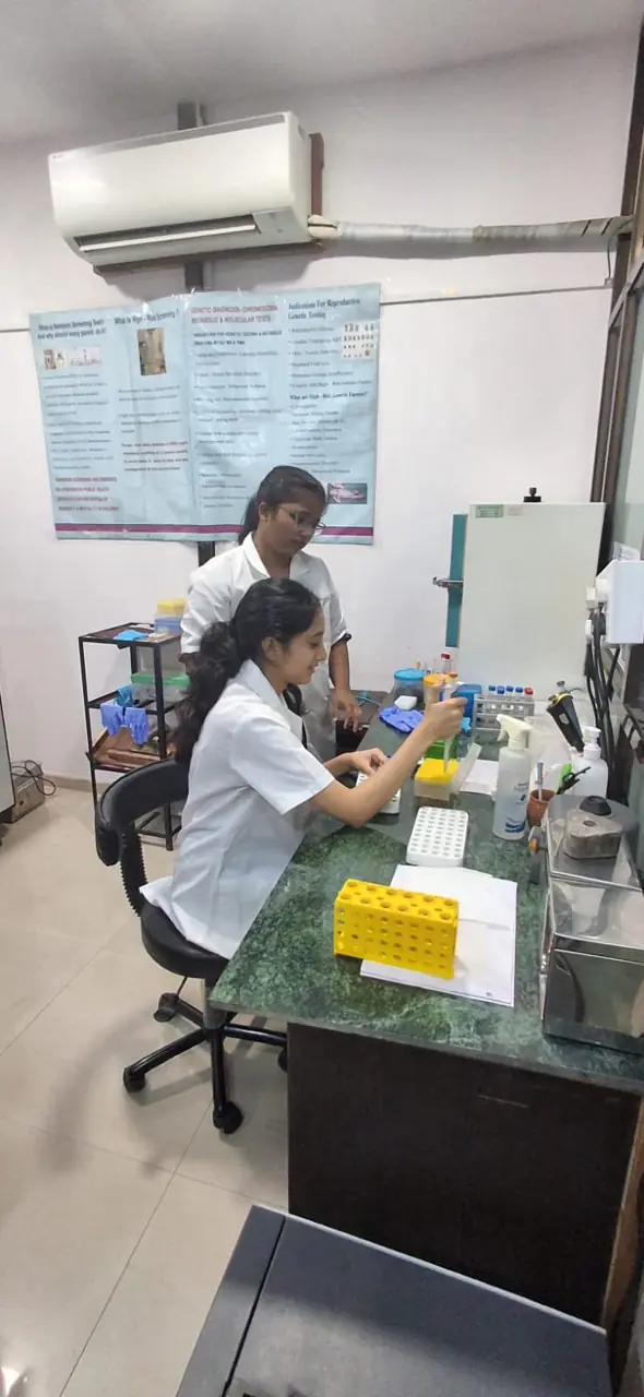At the lab, and with my mentor, Dr Usha Dave (PhD).